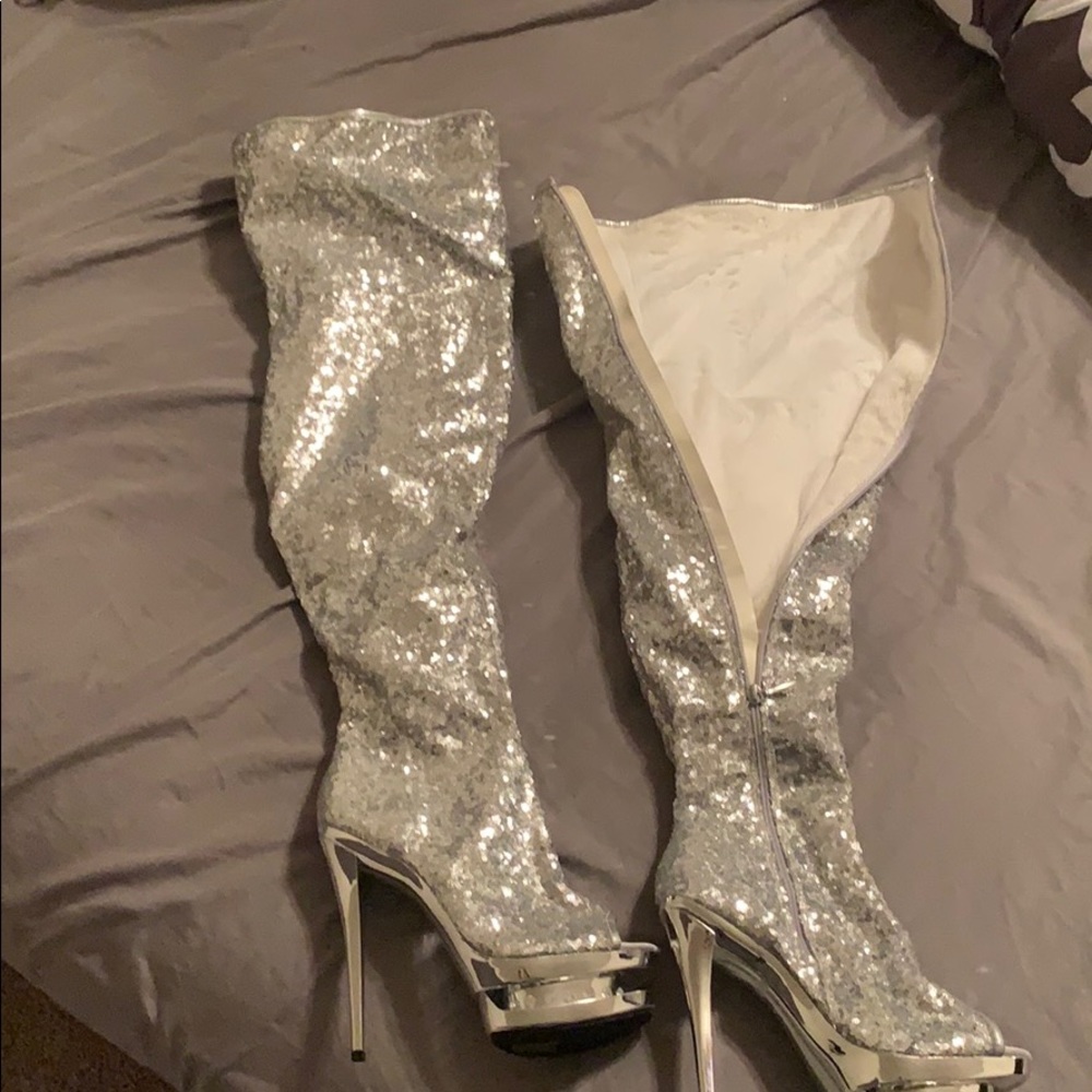 Thigh high heeled boots